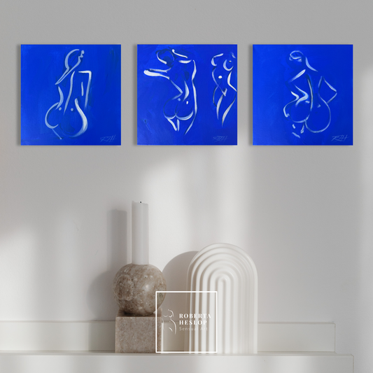 Free, Whole and Revel - the As She Is trio by Roberta Heslop, original blue figurative paintings displayed in a luxury interior