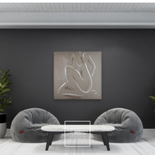 Load image into Gallery viewer, Large, linen figurative painting by Roberta Heslop in modern interior with two gray bean bags and a small table.