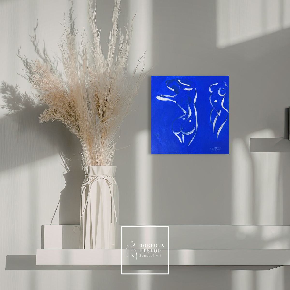Revel by Roberta Heslop displayed in a luxury interior - original blue figurative painting celebrating the female form